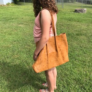 Tina added a photo of their purchase