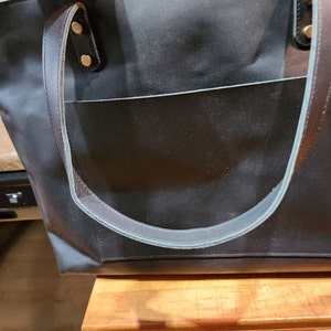Tania added a photo of their purchase