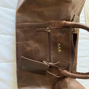 Sarah added a photo of their purchase