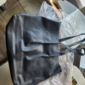 Carolyn added a photo of their purchase