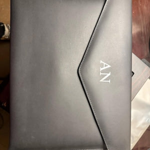 Nayla added a photo of their purchase