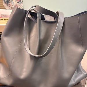 Laura added a photo of their purchase