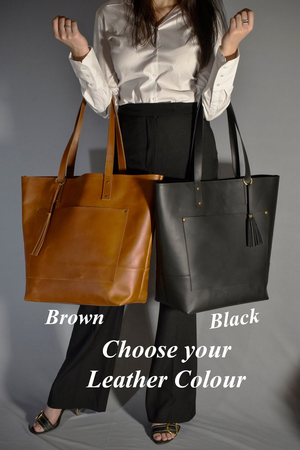 May include: Two leather tote bags, one brown and one black, with a front pocket and a tassel. The text "Choose your Leather Colour" is below the bags.