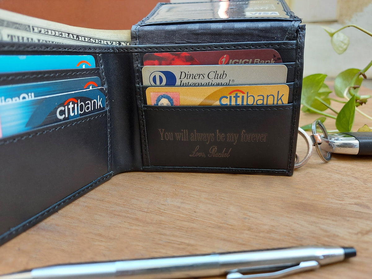 May include: A black leather wallet with multiple card slots and a key chain. The wallet has a personalized inscription that reads "You will always be my forever, Love, Rachel".