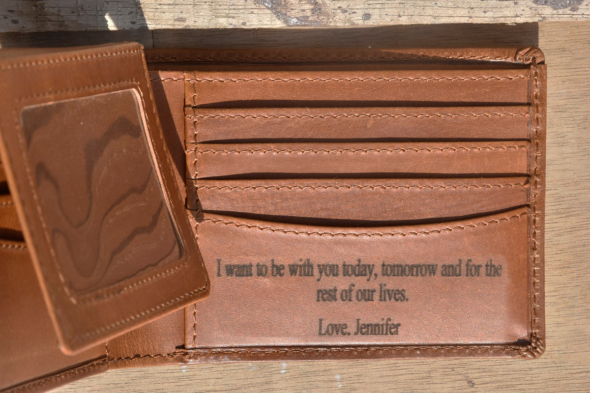 May include: A brown leather wallet with a card slot and a message engraved on the inside: "I want to be with you today, tomorrow and for the rest of our lives. Love. Jennifer"