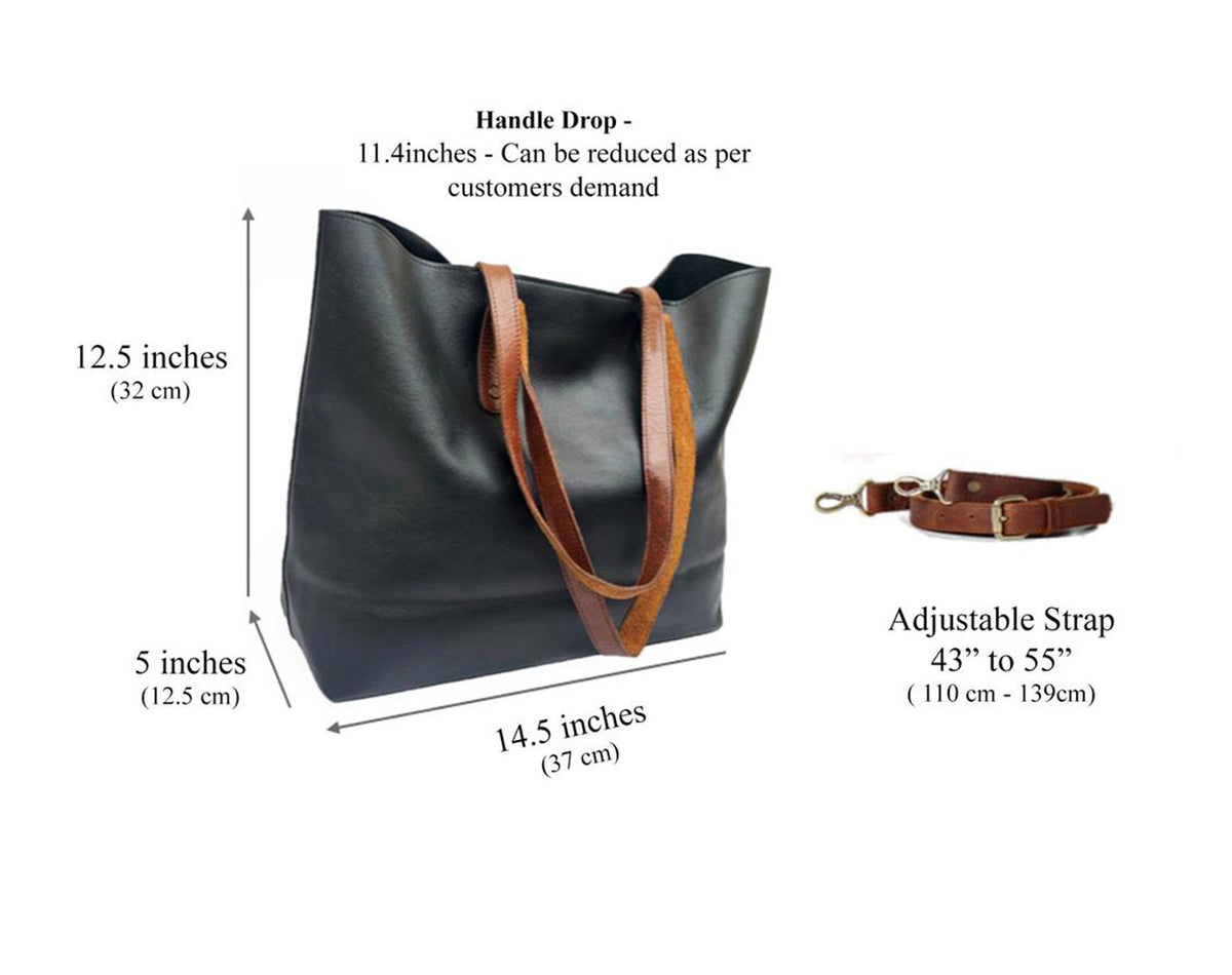 May include: Black leather tote bag with brown leather straps and an adjustable shoulder strap. The bag measures 12.5 inches tall, 14.5 inches wide, and 5 inches deep. The handle drop is 11.4 inches. The adjustable strap is 43 to 55 inches long.