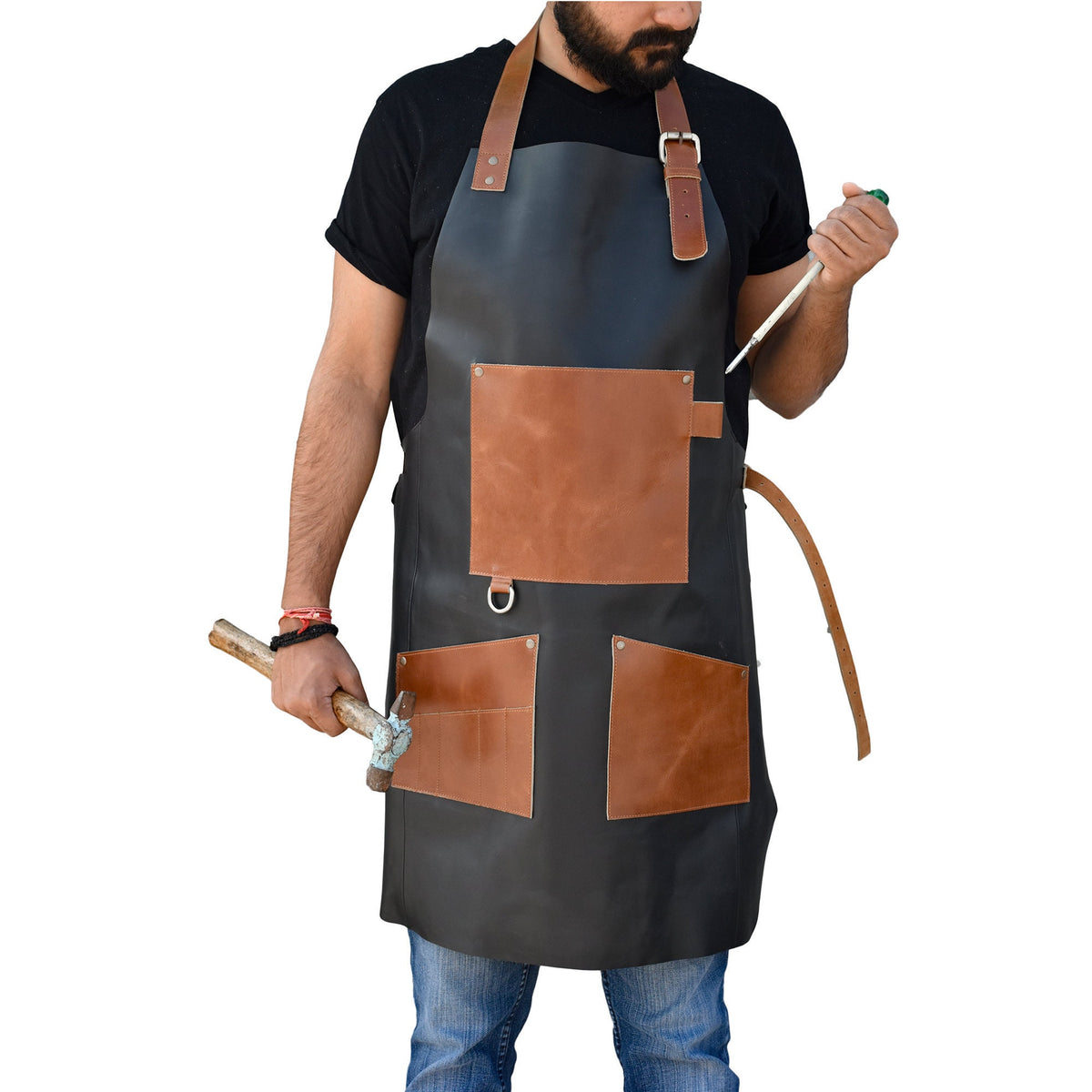 May include: A black leather apron with brown leather accents and multiple pockets. The apron has adjustable straps and a D-ring on the front.