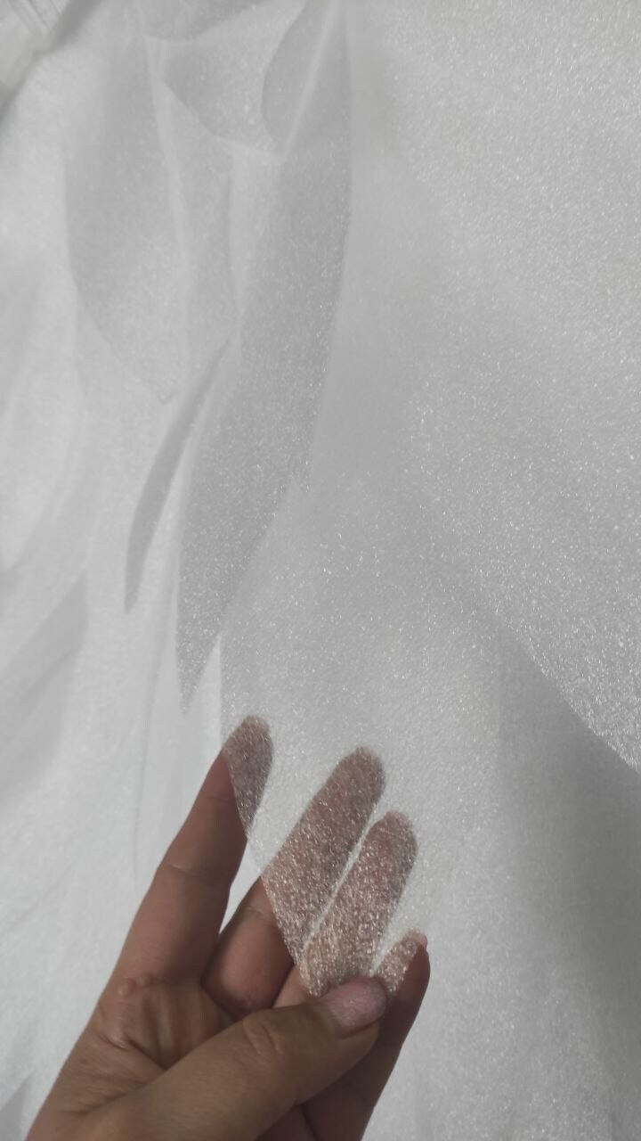 May include: White bubble wrap material with a textured surface. The material is thin and flexible.