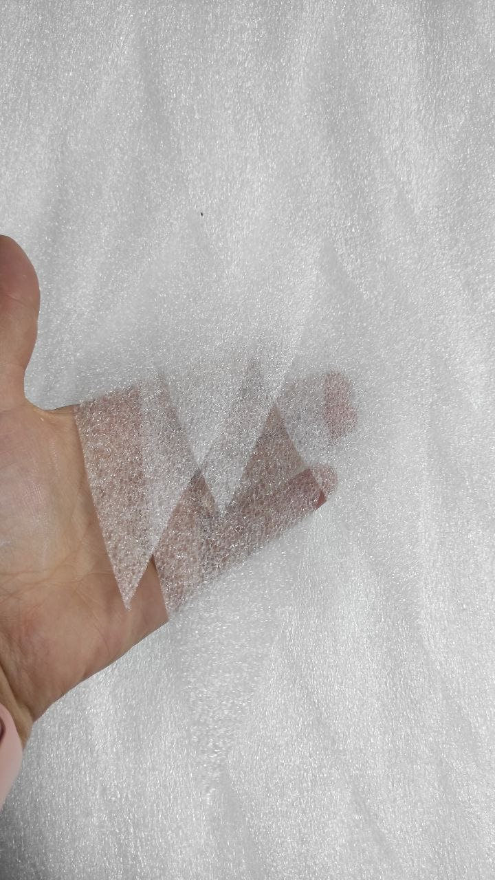 May include: White bubble wrap material, often used for packaging and shipping fragile items.